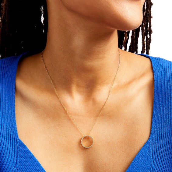 1/6 CT. T.w. Diamond Circle Outline Pendant in 10K Gold