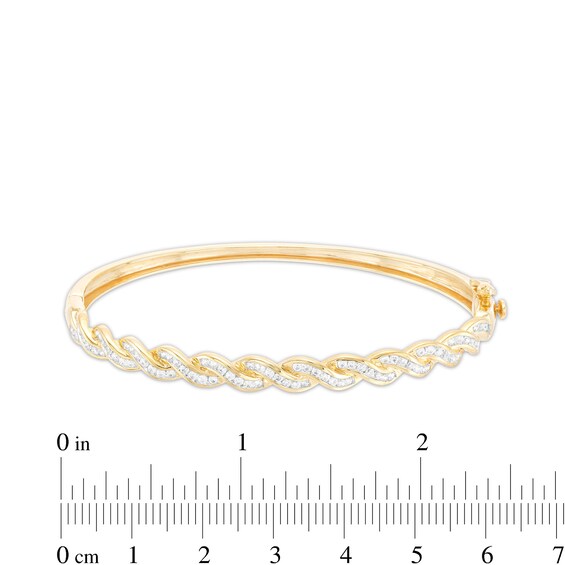 1 CT. T.w. Diamond Twist Bangle in 10K Gold - 7.46"