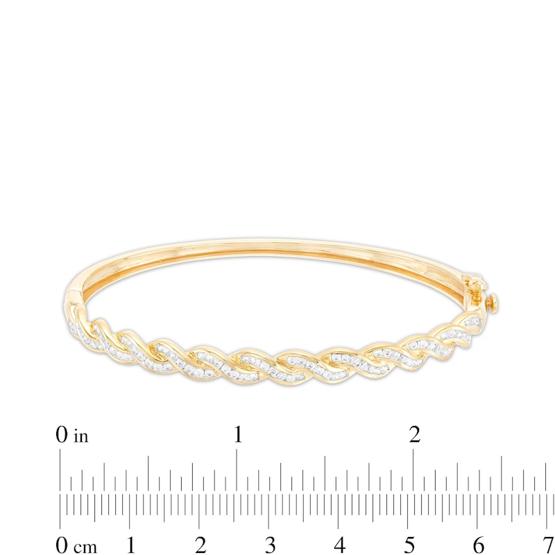 Main Image 3 of 1 CT. T.W. Diamond Twist Bangle in 10K Gold - 7.46"