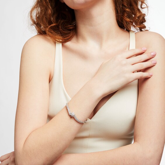 2-1/2 CT. T.w. Diamond Curved Triple Row Knot Bangle in 10K White Gold - 7.46"