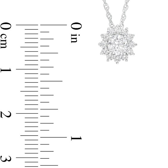 1/2 CT. T.w. Diamond Frame Sunburst Pendant in 10K White Gold
