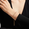 Thumbnail Image 2 of 1/4 CT. T.W. Diamond Infinity Cross Link Bolo Bracelet in 10K Gold – 10"
