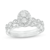 Thumbnail Image 1 of 1/4 CT. T.W. Oval-Shaped Multi-Diamond Scallop Shank Vintage-Style Bridal Set in Sterling Silver