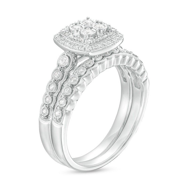 1/4 CT. T.W. Quad Diamond Double Cushion-Shaped Frame Scallop Shank Vintage-Style Bridal Set in Sterling Silver