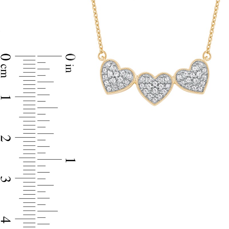 1/6 CT. T.W. Diamond Triple Heart Bead Frame Necklace in Sterling