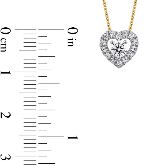 3/8 CT. T.w. Diamond Interior Stone Heart Frame Necklace in 10K Gold