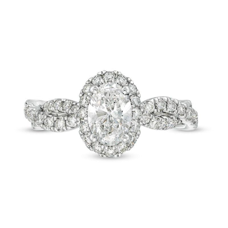 1.07 cttw. Oval Diamond Ring with Small Trio Side Diamonds