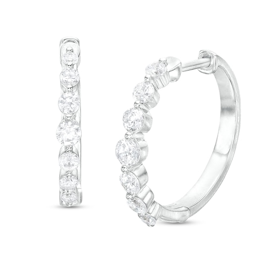 1/ CT. T.w. Diamond Seven Stone Hoop Earrings in 10K White Gold