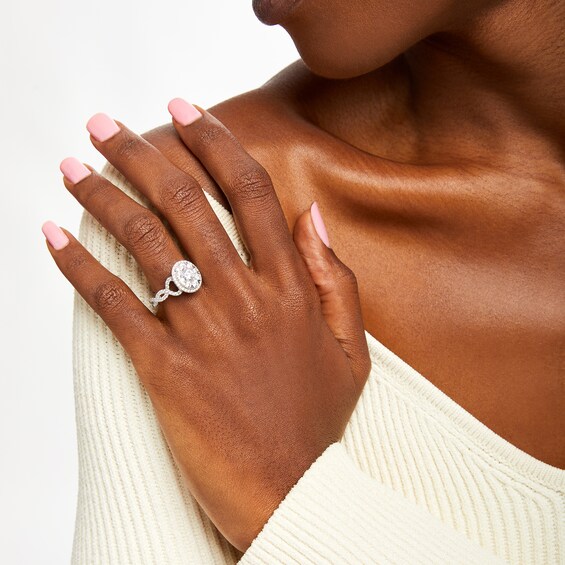 1-1/2 CT. T.w. Oval-Shaped Multi-Diamond Frame Twist Shank Engagement Ring in 14K White Gold (I/I2)