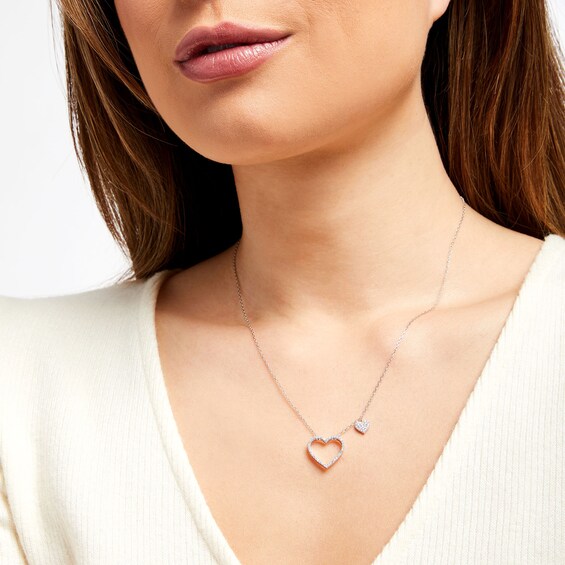 1/4 CT. T.w. Diamond Heart Outline with Heart Dangle Station Necklace in 10K White Gold