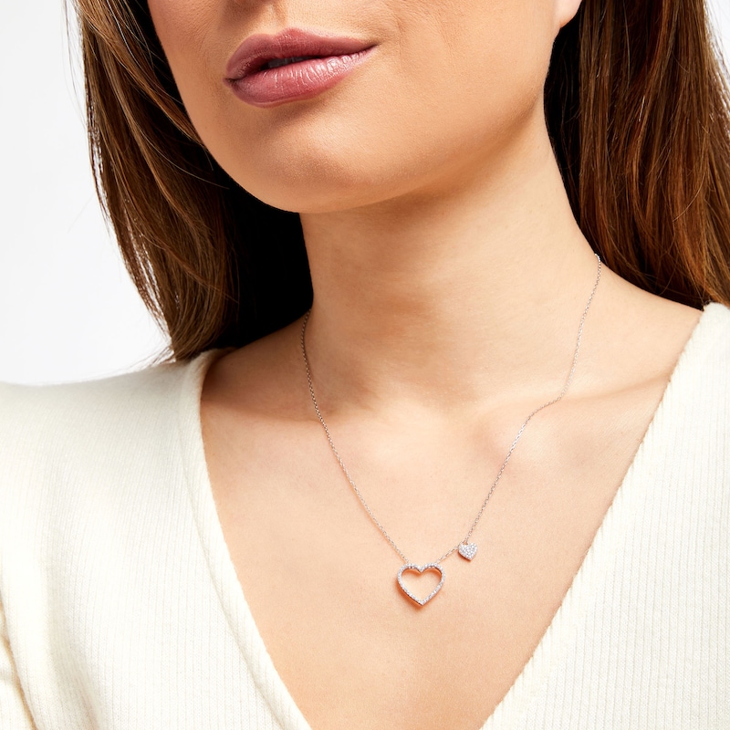 Main Image 2 of 1/4 CT. T.W. Diamond Heart Outline with Heart Dangle Station Necklace in 10K White Gold