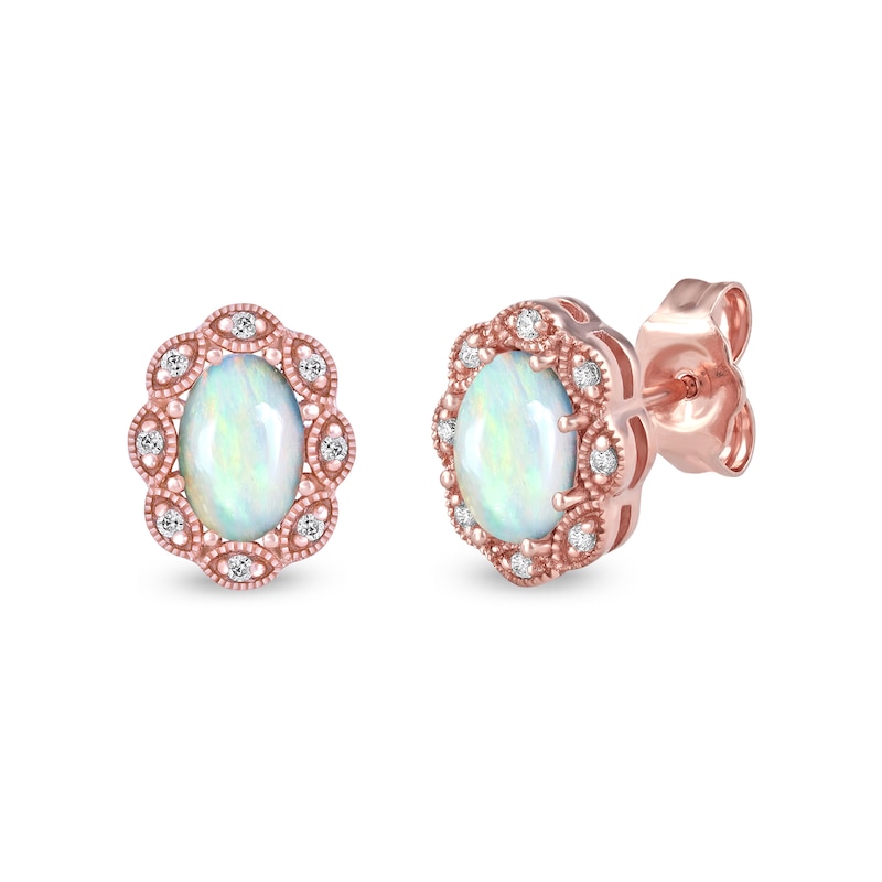 Main Image 1 of Oval Opal and 1/20 CT. T.W. Diamond Scallop Frame Art Deco Stud Earrings in 10K Rose Gold