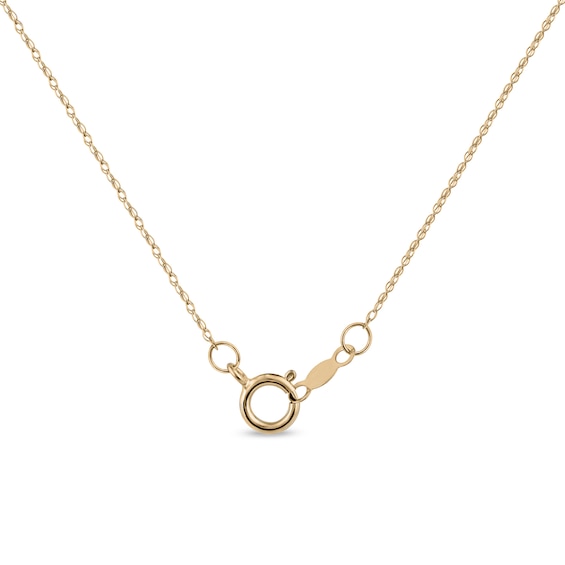 Oval Opal and 1/8 CT. T.w. Baguette and Round Diamond Starburst Frame Pendant in 10K Gold