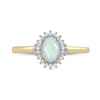 Thumbnail Image 2 of Oval Opal and 1/8 CT. T.W. Baguette and Round Diamond Starburst Frame Ring in 10K Gold