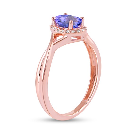 Oval Tanzanite and 1/20 CT. T.w. Diamond Frame Twist Shank Ring in 10K Rose Gold