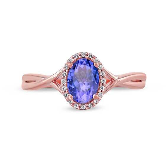 Oval Tanzanite and 1/20 CT. T.w. Diamond Frame Twist Shank Ring in 10K Rose Gold