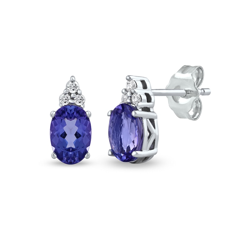 Main Image 1 of Oval Tanzanite and 1/20 CT. T.W. Diamond Tri-Top Stud Earrings in 10K White Gold