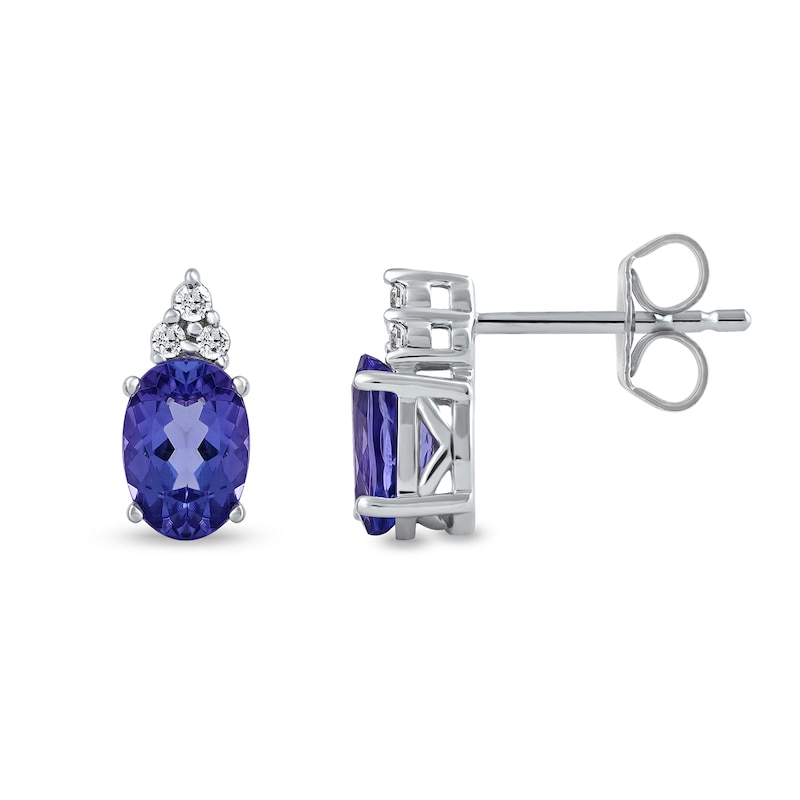Main Image 2 of Oval Tanzanite and 1/20 CT. T.W. Diamond Tri-Top Stud Earrings in 10K White Gold