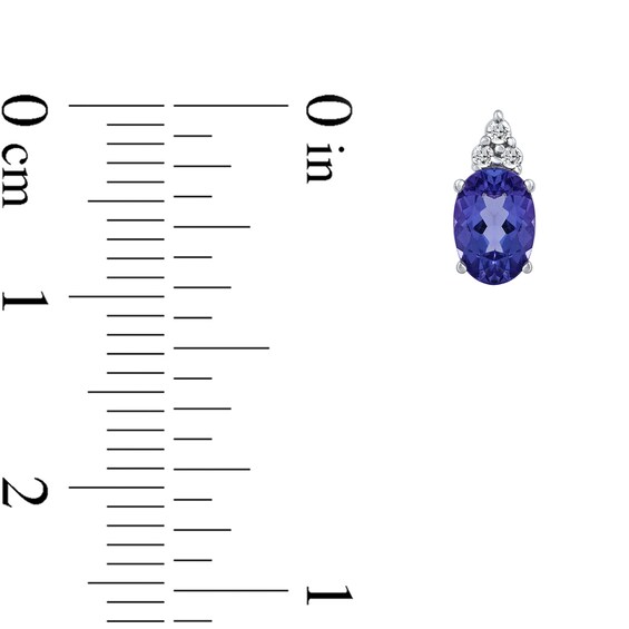 Oval Tanzanite and 1/20 CT. T.w. Diamond Tri-Top Stud Earrings in 10K White Gold