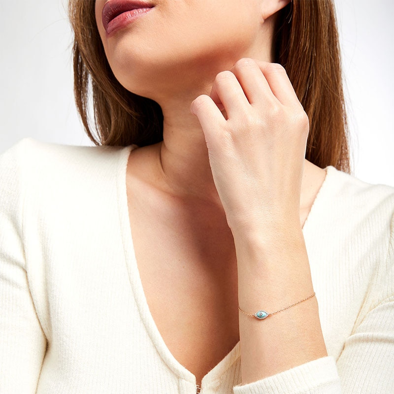 Main Image 2 of 1/10 CT. T.W. Diamond Frame Blue Enamel Evil Eye Bracelet in Sterling Silver with 14K Rose Gold Plate