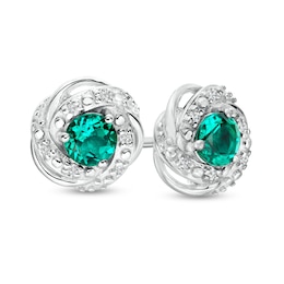 4.0mm Lab-Created Emerald and 1/20 CT. T.W. Diamond Frame Love Knot Stud Earrings in Sterling Silver