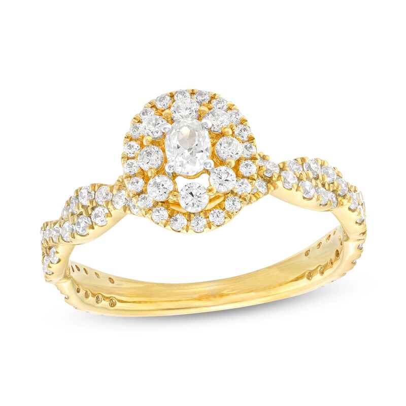 Main Image 1 of 3/4 CT. T.W. Oval Diamond Double Frame Twist Shank Engagement Ring in 14K Gold