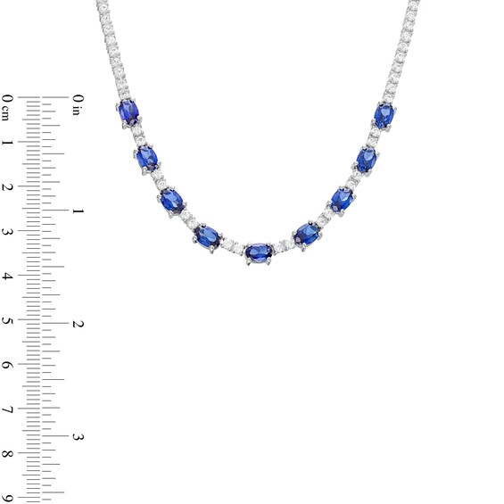 Oval Blue and White Lab-Created Sapphire Nine Stone Station Necklace in Sterling Silver