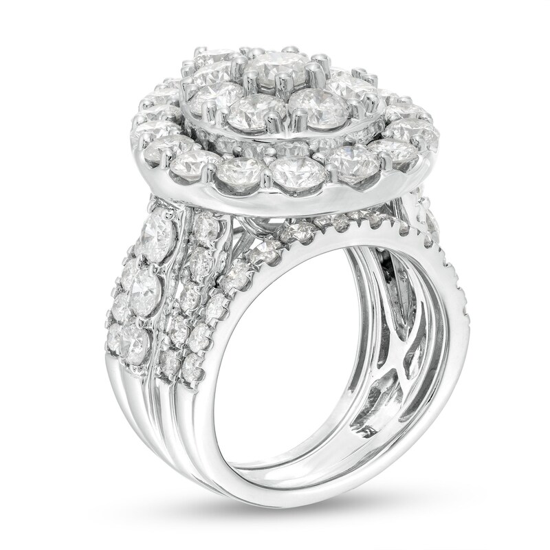 7 CT. T.W. Pear-Shaped Multi-Diamond Frame Three Piece Bridal Set in 14K White Gold