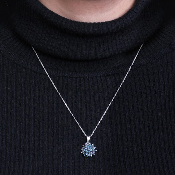 3/4 CT. T.w. Baguette and Round Blue Multi-Diamond Sunburst Drop Pendant in Sterling Silver and Black Rhodium