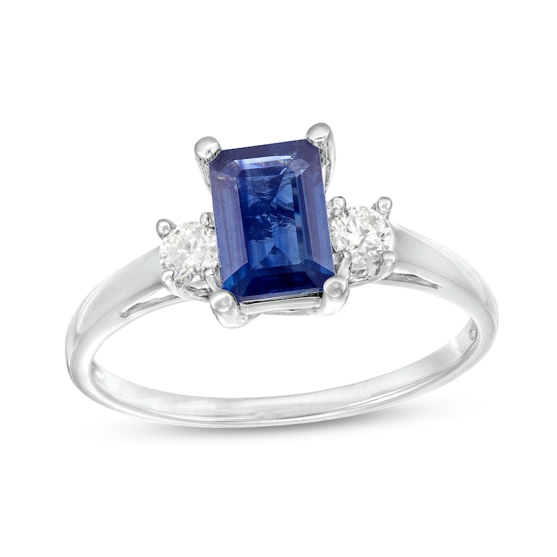 Main Image 1 of Emerald-Cut Blue Sapphire and 1/5 CT. T.W. Diamond Three Stone Ring in 14K White Gold