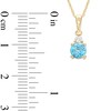 Thumbnail Image 2 of Swiss Blue Topaz and 1/15 CT. T.W. Diamond Stacked Drop Pendant and Stud Earrings Set in 10K Gold