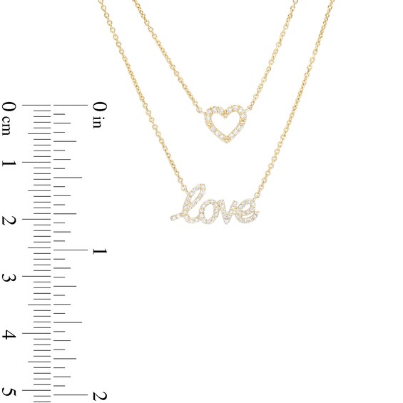 Love Talks 1/6 CT. T.w. Diamond "love" Cursive Script and Heart Double Strand Necklace in 10K Gold