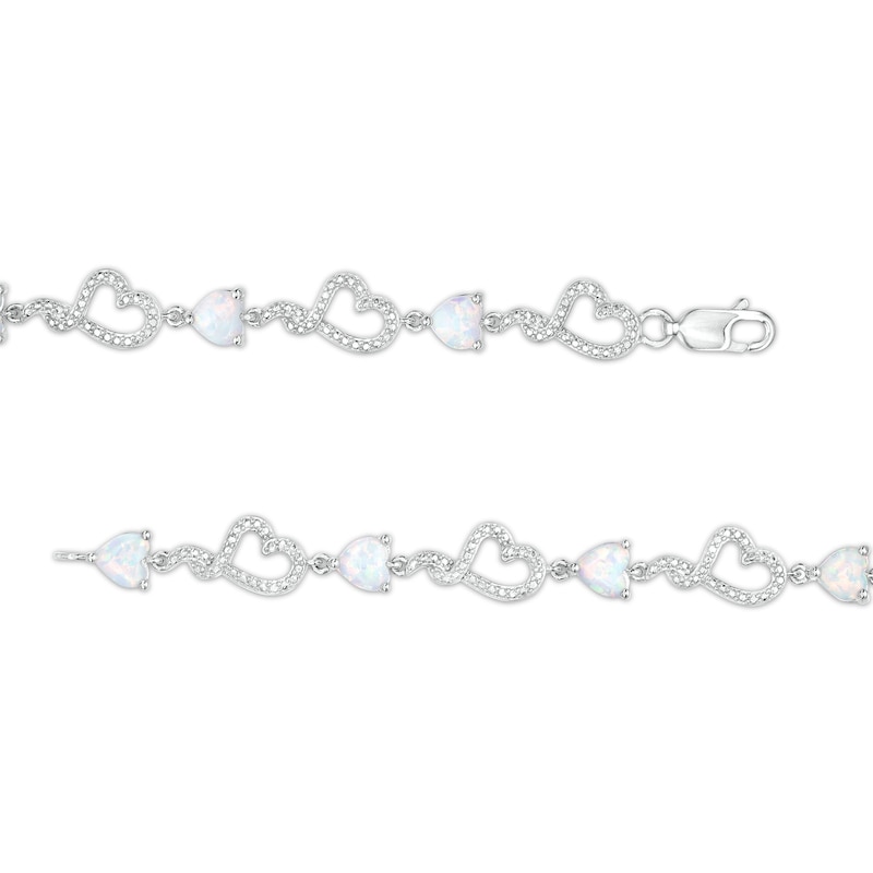 5.0mm Heart-Shaped Lab-Created Opal and Diamond Accent Beaded Abstract Ribbon Heart Bracelet in Sterling Silver - 7.25"