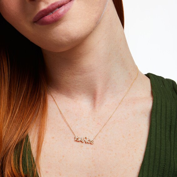 Love Talks 1/6 CT. T.w. Diamond "15 AÃ±os" Script Necklace in 10K Gold