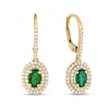 Thumbnail Image 0 of Oval Emerald and 3/8 CT. T.W. Diamond Double Frame Drop Earrings in 14K Gold