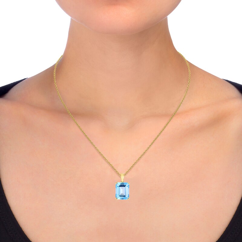 Main Image 2 of Emerald-Cut Blue Topaz Solitaire Pendant in 14K Gold