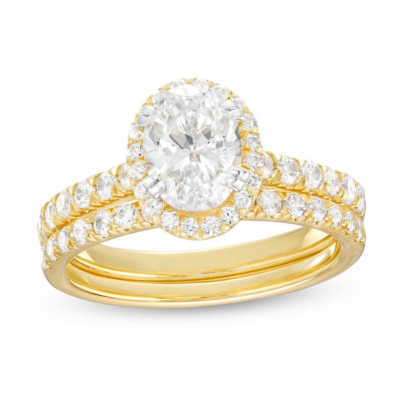 1-3/4 CT. T.W. Certified Oval Lab-Created Diamond Frame Bridal Set in 14K Gold (I/SI2)