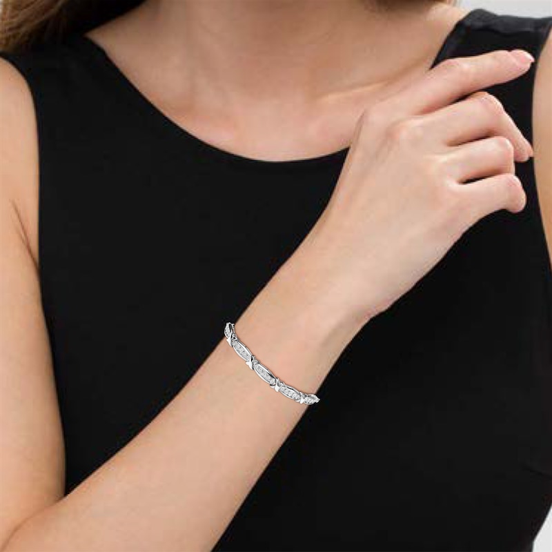 1/10 CT. T.W. Diamond Five Stone and "X" Station Bolo Bracelet in Sterling Silver - 10.5"