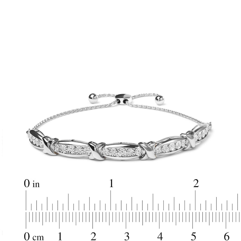 1/10 CT. T.W. Diamond Five Stone and "X" Station Bolo Bracelet in Sterling Silver - 10.5"