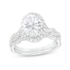 Thumbnail Image 1 of 2-5/8 CT. T.W. Certified Oval Lab-Grown Diamond Frame Twist Shank Bridal Set in 14K White Gold (I/SI2)