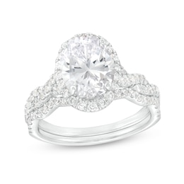 2-5/8 CT. T.W. Certified Oval Lab-Grown Diamond Frame Twist Shank Bridal Set in 14K White Gold (I/SI2)