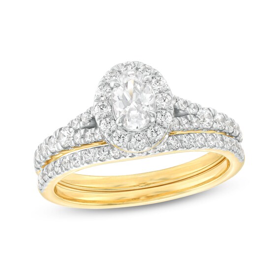 1-1/4 CT. T.w. Oval Diamond Frame Split Shank Bridal Set in 14K Gold