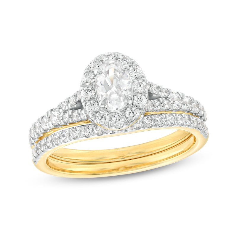 Main Image 1 of 1-1/4 CT. T.W. Oval Diamond Frame Split Shank Bridal Set in 14K Gold