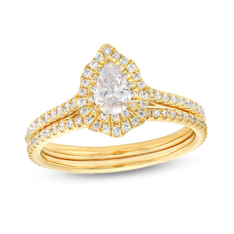 Main Image 1 of 1 CT. T.W. Pear-Shaped Diamond Double Scallop Frame Bridal Set in 14K Gold