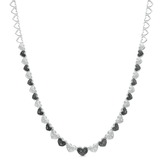 1/10 CT. T.w. Black and White Diamond Beaded Graduated Alternating Hearts Necklace in Sterling Silver and Black Resin