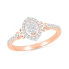 Thumbnail Image 0 of 1/5 CT. T.W. Oval Multi-Diamond Frame Scroll Shank Promise Ring in 10K Rose Gold