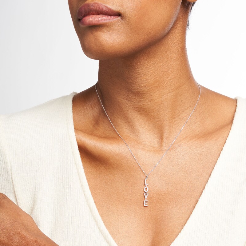 Main Image 2 of Love Talks 1/6 CT. T.W. Diamond "LOVE" Vertical Drop Pendant in 10K White Gold