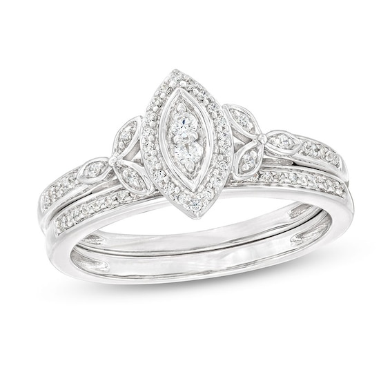 1/4 CT. T.w. Marquise-Shaped Multi-Diamond Frame Leaf-Sides Ribbon Shank Bridal Set in Sterling Silver