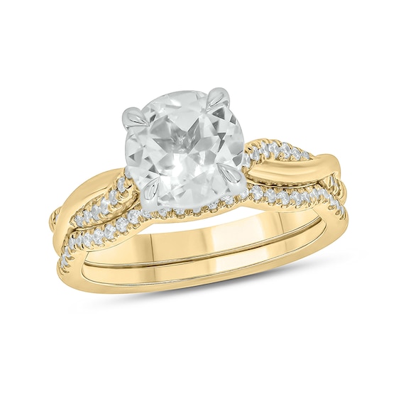 8.0mm White Lab-Created Sapphire and 1/4 CT. T.w. Diamond Twist Shank Bridal Set in 10K Gold