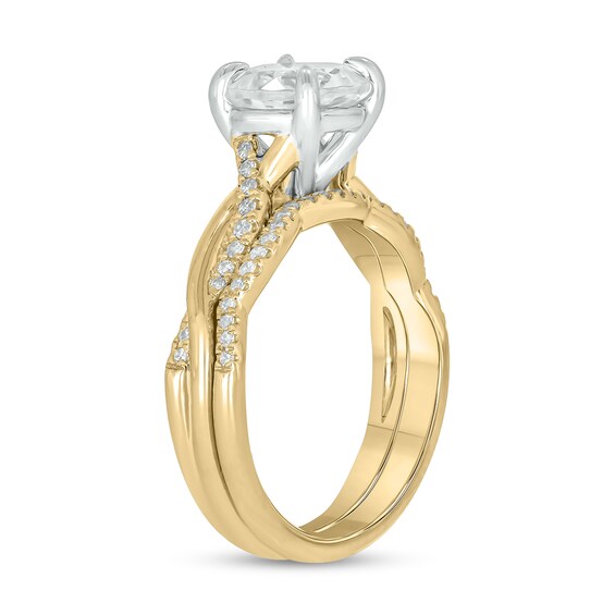 8.0mm White Lab-Created Sapphire and 1/4 CT. T.w. Diamond Twist Shank Bridal Set in 10K Gold